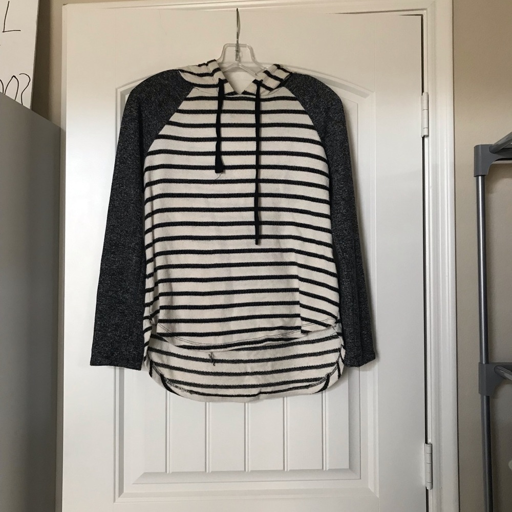 White with black sleeves and grey sleeves sweater